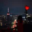 Placeholder: a romantic city view at night, red vibes