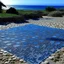 Placeholder: An indigo gelatinous beach designed in ancient Roman mosaics