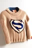 Placeholder: Superman's Balenciaga sweater Winter elegant inspired by Superman's emblem design beige tones with dual color on a white background, product catalog photography, soft spot lighting, depth of field, 4k –ar 3:5 –q 2