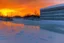 Placeholder: Sunset, winter, cyberpunk buildings in the ice, tendency to science fiction, impressionism painting