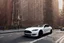 Placeholder: A Tesla 'Model S' is parked, near the 'Central Synagogue' in New York City. (CINEMATIC, WIDE ANGLE LENS, PHOTO REAL)