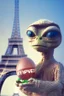 Placeholder: E.T. the Extra Terrestrial holding a decorated Easter egg in front of the Eiffel Tower