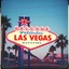 Placeholder: 1970's travel poster, analogue photography, retro-style, the Las Vegas Welcome to Las Vegas sign, palm trees, pastel colors, vaporwave