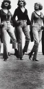 Placeholder: Four Ziegfeld Girls on jeans walking