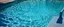 Placeholder: the rippled surface of the water in a pool