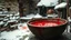 Placeholder: close up an old bowl is full red blood on snowy poor villager courtyard, dramatic atmosphere, in background blur , low light, high detailed, sharp focus, high realistic, perfect photo