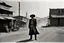 Placeholder: [very impressive high res masterpiece in Kodak Eastman 5247, scene by László Krasznahorkai] the Black or Afro-American sheriff in the Wild West. A tale as rare and powerful as a shooting star in the night sky. Picture this: a lone figure, standing tall in the dusty streets of a frontier town, a badge gleaming on their chest, defying the odds and challenging the stereotypes of the time.