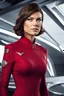 Placeholder: In this surreal vision, Lauren Cohan stands tall on the iconic bridge of the USS Enterprise. Adorned in a striking Star Trek Original Series red uniform, she embodies the essence of command and adventure. Her shortish hair adds a touch of modernity to the classic ensemble, a symbol of her strength and individuality. Ample bosoms, a reminder of her femininity, are embraced by the uniform, a testament to the diverse and empowering representation within the Star Trek universe. Her black boots, firm