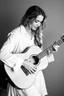 Placeholder: beautiful woman playing acoustic guitar in mid west blck and white old photto