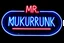 Placeholder: a very big blue whita neon sign that say "MR. KUKRUNK" , black background, flashes and sparks