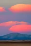 Placeholder: big rock mountains with and orange dawn sky with no clouds. mountains closer to the camara