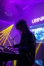 Placeholder: French cool synth player with crazy techno acid hair, he is called "Jean-Maurice Brûlée" performing at dance club, his name is "Jean-Maurice Brûlée" , white and purple Neon lights and purple smog, yellow water shower rain sprays, and "URINIUM" big sign on the wall, he is playing on synthesizers on stage with lot of laser beams and wearing black sunglasses, an earth is projected in background