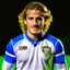 Placeholder: Diego Forlan Football soccer player posing.