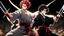 Placeholder: yujiro hanma vs yoriichi tsugukuni, baki vs kimetsu no yaiba, two mans standing in front of each other, a big strong man in black shirt with red hair and evil grin in martial art's stance facing a smaller feminine swordsman with long hair and calm face reaching for his sword in traditional japanese clothes both preparing to fight each other