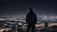 Placeholder: An Englishman in a bomber jacket standing at the top of a tall building looking across a city at night