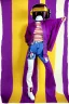 Placeholder: Photograph of a woman. Huge prints on denim,terracotta, cream and purple, lilac. Cream colored latex parts. imperial yellow, red plum mixed stripes, only on top half of t-shirt. Plant print.European daft punk woman. Baggy, low waist jeans, 1996! Mantle is sewed of recycled Denim and sewed together of recycled polymer felt. lace, Yellow(Munsell) areas. hint of orange as effect color!!Big bright purple/khaki felt tippet and cream or blue or lilac colored-hood. mantle is merged with cobalt boler