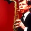 Placeholder: REd-haired Ron howard Is richie from happy days playing his saxophone with his "eyes closed", rock band, embouchure, joanie cunningham