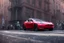 Placeholder: A Tesla 'Model Y' is racing at top speed, in Greenwich Village, in Manhattan. CINEMATIC. WIDE ANGLE LENS. PHOTO REAL.