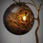 Placeholder: a gorgeous, stunning lamp made of gnarled wood with illuminated globe of light hanging off one branch sitting on gilded cloth, 8k resolution, high-quality, fine-detail, photorealistic, intricate, digital art, detailed matte, volumetric lighting, illustration, 3D octane render, brian froud, howard lyon, selina french, anna dittmann, annie stokes, lisa parker, greg rutowski, George Grie, Ben Goossens, Igor Morski