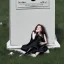 Placeholder: Girl crying laying next to a tombstone