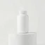 Placeholder: mockup of a plain white medicine bottle neatly placed on a podium on a neutral background, Ai generated Images