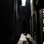 Placeholder: inhuman shadow looming over an alleyway