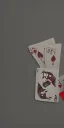 Placeholder: Joker playing with cards dark background