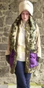 Placeholder: Young fleshy woman. thick thighs, average body type. Mantle is sewed of recycled Denim and sewed together of camouflage pieces. Camouflage colors are orange,terracotta, cream and purple. Cream latex gaiter. More yellow(Munsell)!!!Big bright purple/khaki felt tippet and cream or blue or lilac colored-hood. mantle is merged with satchel. . AKG-style headphones (gold rings!) is merged with small felt cap with small visor. Style: Haute Couture in 1936, Paris fashion in 2023.