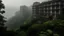 Placeholder: Generate an image of shrouded in mist and surrounded by lush greenery, emphasizing the natural beauty that contrasts with the hotel's dark history