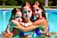 Placeholder: beautiful auburn hair teenage laracroft girls with grandpa in a swimming pool, hugging dad bare lips