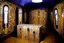Placeholder: A violet tomb with ghosts and mummies designed in Navajo woven art painted by Gustav Klimt