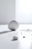 Placeholder: plain white floor, plain white background, one large gray stone in the foreground, small sparkles falling from above in the background