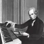 Placeholder: Immanuel Kant playing a modular synthesizer