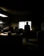 Placeholder: Imagine a scenario where the footage captures a man in a dimly lit office late at night, his shadowy figure moving mysteriously across the room. The flickering lights create an eerie, security camera vision frame