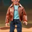 Placeholder: wide view Fonzie Winkler toy Action figure doll 1975 realistic (thumbs-up) (face) grin, fonzarelli, jukebox background