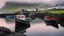 Placeholder: Fishermen’s boats anchored around a harbour in the Faroe Islands near a fishing village, fishermen putting fishing nets on their boats, mist covering the distance, calm sea, early morning, sunrise, the moment the sun rises, beautiful romantic photograph, excellent composition, atmospheric, realistic