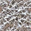 Placeholder: A detailed winter camouflage pattern. various shades of brown, beige, and off-white branches, twigs, and grasses covered in a layer of light gray and white snow. The branches are gnarled and textured, with varying thicknesses and shapes. The snow appears as a soft, subtle coating over the vegetation. The perspective is a close-up view of the camouflage pattern, filled with overlapping details that create a realistic representation of a wintry forest scene. muted colors, seamless tile
