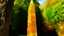 Placeholder: A yellowish orange colored crystal obelisk painted by Claude Monet