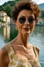 Placeholder: Act like a fashion photographer. Create a realistic photograph of a small Italian town at Como Lake in late spring with a 45-year-old, young look as her age, beautiful, Italian woman in Sophia Loren style with short hair and black eyes. Use a wide lens and a Fuji T30 camera for mild light, warm, golden hour photos from a distance, elegant red dress, romantic pose, Richard Avedon style