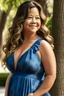 Placeholder: Gina Rodriguez in transformed state, naturally blonde curls, radiant glow, dress perfectly fits, accentuating ample pregnancy curves, nine-month pregnant silhouette, facial features refined, serene expression, maternally radiant. The maternity dress elegantly drapes over her transformed figure, emphasizing the curves and the pronounced pregnancy. The enchantment complete, Gina stands as a vision of maternal beauty, embodying the essence of a 25-year-old, six-month-pregnant woman within the magic