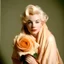 Placeholder: A photograph of sad childish marilyn monroe, head backwards , with a rose, , with spiky hair, no make up, in the style of milton greene, a pale orange silk scarf around her shoulders, white bacground, soft intimate lightning