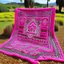 Placeholder: A pink land made out of Navajo yarn designed in Kuna Molas