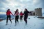 Placeholder: a group of Turkish young ladys in sports pants and blouse are dancing in Babak Castle in Iran west north ,cloudy sun set sky,snowy environment