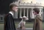 Placeholder: realistic young Harry Potter talking to Dobby in front of white house