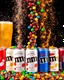 Placeholder: An image of several cans of different sodas side by side at the bottom of the image, from which M&M chocolates are pouring out, and the space is filled with color, chocolate grains, and pieces of fruit in a soda-like atmosphere with happy and beautiful colors.
