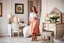 Placeholder: very beautiful lady with beautiful midi skirt and blouse standing next to her couple in a luxury bedroom with high heels next to makeup desk looking to camera