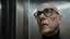 Placeholder: A striking, photorealistic portrait of Chris, a middle-aged european man with a slightly shaven head , wearing black square glasses, black shirta and makes a scared face. The background reveals a futuristic neon light, designed with modern, sleek lines and advanced technology. The overall ambiance gives off a sense of professionalism and cutting-edge innovation., photohigh detalied, sharp focus, professional photo