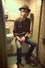 Placeholder: Tall and skinny game designer spends his day on the toilet