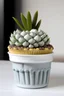 Placeholder: Create an image of a mini concrete succulent planter shaped like a cupcake, with textured "frosting" and a succulent nestled on top.