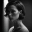 Placeholder: close-up portrait of a girl in a dark room, in profile, eyes downcast, short hair, behind her there is a light highlight on the wall, a stylish black and white photograph in the style of Peter Lindbergh